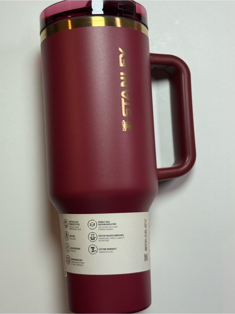 Stanley Burgundy Travel Mug with Gold Trim and Handle